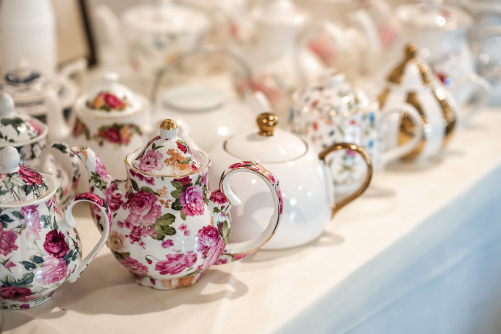 A beautiful collection of teapots waiting to serve austin high tea at Rose Haven, Austin Tea Room, austin wedding venue, cheap rehearsal dinner venue near me, dripping springs wedding venue, austin bride