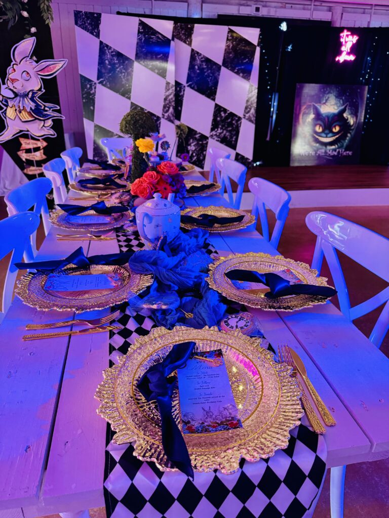  alice in wonderland party, austin event venue, austin banquet hall, austin party venue, best venues in austin, holiday party, best venue for austin work event, lighting, decor, party decor, event design, tea party, teapot, white rabbit, mad hatter