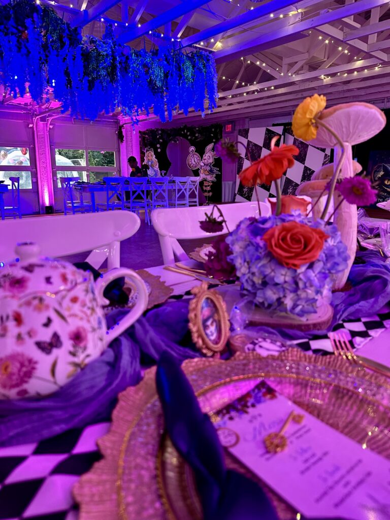  alice in wonderland party, austin event venue, austin banquet hall, austin party venue, best venues in austin, holiday party, best venue for austin work event, lighting, decor, party decor, event design, table decor, details, johnny dep, mad hatter, menu, key