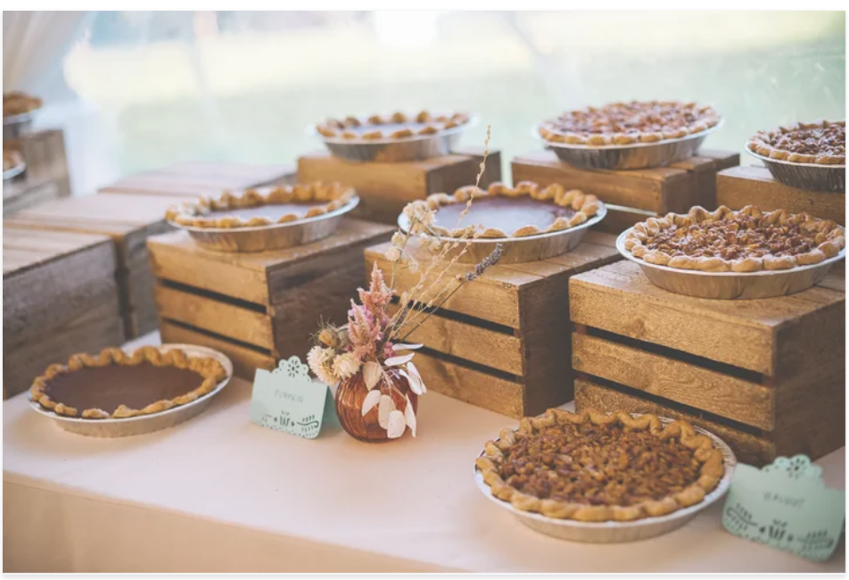 austin wedding catering dessert table pies stacked on crates, fall wedding, autumn wedding, austin wedding venue, cheap wedding ideas, dripping springs, texas hill country